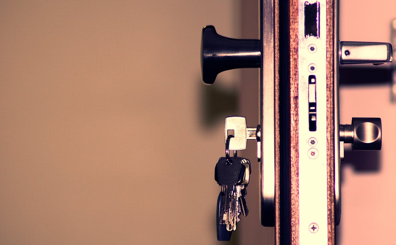 our-services-1 Detailed view of a door lock and keys emphasizing security and access.